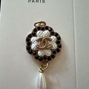 Fashion Inspired Gold and Black Flower Pendant